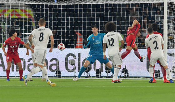 Kashima Antler's defender Gen Shoji (3rd -R) heads the ball towards goal during the semi final football match of the FIFA Club World Cup 2018 tournament between Japan's Kashima Antlers and Spain's Real Madrid at the Zayed Sports City Stadium in Abu Dhabi, the capital of the United Arab Emirates, on December 19, 2018. (Photo by Giuseppe CACACE / AFP) (Photo credit should read GIUSEPPE CACACE/AFP/Getty Images)