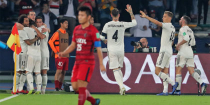 Real Madrid's players celebrate their opening goal during the semi final football match of the FIFA Club World Cup 2018 tournament between Japan's Kashima Antlers and Spain's Real Madrid at the Zayed Sports City Stadium in Abu Dhabi, the capital of the United Arab Emirates, on December 19, 2018. (Photo by KARIM SAHIB / AFP) (Photo credit should read KARIM SAHIB/AFP/Getty Images)