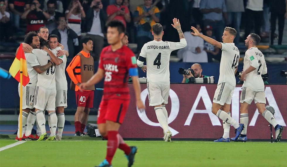 Real Madrid's players celebrate their opening goal during the semi final football match of the FIFA Club World Cup 2018 tournament between Japan's Kashima Antlers and Spain's Real Madrid at the Zayed Sports City Stadium in Abu Dhabi, the capital of the United Arab Emirates, on December 19, 2018. (Photo by KARIM SAHIB / AFP) (Photo credit should read KARIM SAHIB/AFP/Getty Images)