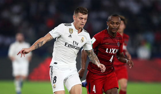 ABU DHABI, UNITED ARAB EMIRATES - DECEMBER 19: Toni Kroos of Real Madrid is closed down by Hugo Leonardo of Kashima Antlers during the FIFA Club World Cup semi-final match between Kashima Antlers and Real Madrid at Zayed Sports City Stadium on December 19, 2018 in Abu Dhabi, United Arab Emirates. (Photo by Francois Nel/Getty Images)