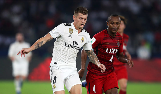 ABU DHABI, UNITED ARAB EMIRATES - DECEMBER 19: Toni Kroos of Real Madrid is closed down by Hugo Leonardo of Kashima Antlers during the FIFA Club World Cup semi-final match between Kashima Antlers and Real Madrid at Zayed Sports City Stadium on December 19, 2018 in Abu Dhabi, United Arab Emirates. (Photo by Francois Nel/Getty Images)