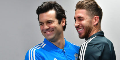 Real Madrid's Argentinian coach Santiago Solari (L) embraces his Spanish defender and captain Segio Ramos as they attend a press conference on the eve of their FIFA Club World Cup final match against Al-Ain, in the Emirati capital Abu Dhabi on December 21, 2018. (Photo by GIUSEPPE CACACE / AFP) (Photo credit should read GIUSEPPE CACACE/AFP/Getty Images)