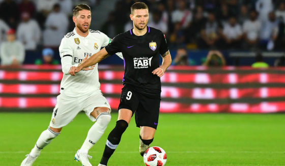 Real Madrid's Spanish defender Sergio Ramos (L) marks Al-Ain's forward Marcus Berg (R) during the Final match in the FIFA Club World Cup football competition between Real Madrid and Al-Ain at the Zayed Sports City Stadium in Abu Dhabi, the capital of the United Arab Emirates, on December 22, 2018. (Photo by Giuseppe CACACE / AFP) (Photo credit should read GIUSEPPE CACACE/AFP/Getty Images)