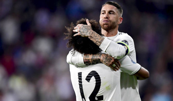Real Madrid's Spanish defender Sergio Ramos congratulates Real Madrid's Brazilian defender Marcelo for scoring their team's second goal during the UEFA Champions League group G football match between Real Madrid CF and FC Viktoria Plzen at the Santiago Bernabeu stadium in Madrid on October 23, 2018. (Photo by JAVIER SORIANO / AFP) (Photo credit should read JAVIER SORIANO/AFP/Getty Images)