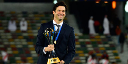 Real Madrid's Argentinian coach Santiago Solari celebrates with the trophy after winning the FIFA Club World Cup final football match Spain's Real Madrid vs Abu Dhabi's Al Ain at the Zayed Sports City Stadium in Abu Dhabi, the capital of the United Arab Emirates, on December 22, 2018. (Photo by Giuseppe CACACE / AFP) (Photo credit should read GIUSEPPE CACACE/AFP/Getty Images)