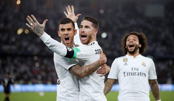 ABU DHABI, UNITED ARAB EMIRATES - DECEMBER 22: Sergio Ramos of Real Madrid celebrates with teammates Marcelo and Daniel Ceballos after scoring his team's third goal during the FIFA Club World Cup UAE 2018 Final between Al Ain and Real Madrid at the Zayed Sports City Stadium on December 22, 2018 in Abu Dhabi, United Arab Emirates. (Photo by Francois Nel/Getty Images)