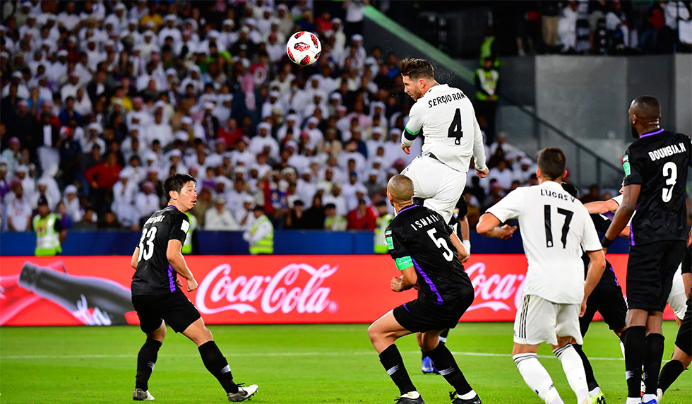 Real Madrid's Spanish defender Sergio Ramos (number 4) heads the ball and scores during the FIFA Club World Cup final football match Spain's Real Madrid vs Abu Dhabi's Al Ain at the Zayed Sports City Stadium in Abu Dhabi, the capital of the United Arab Emirates, on December 22, 2018. (Photo by Giuseppe CACACE / AFP) (Photo credit should read GIUSEPPE CACACE/AFP/Getty Images)