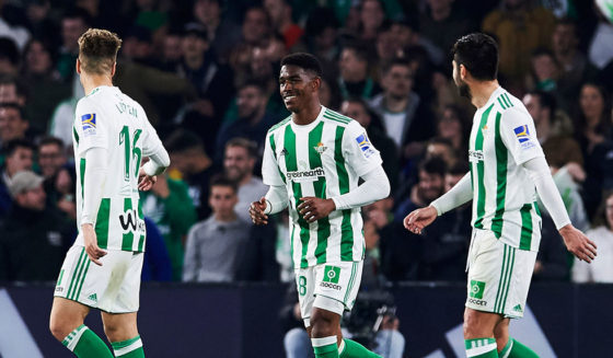 SEVILLE, SPAIN - FEBRUARY 18: Junior Firpo of Real Betis Balompie celebrates after Nacho Fernandez of Real Madrid scored an own goal during the La Liga match between Real Betis and Real Madrid at Benito Villamrin stadium on February 18, 2018 in Seville, Spain. (Photo by Aitor Alcalde/Getty Images)