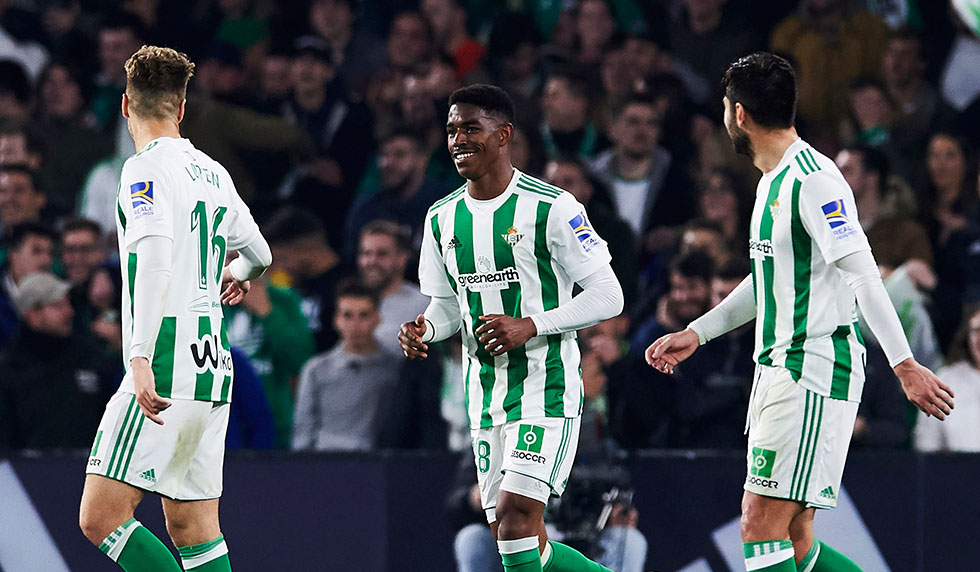 SEVILLE, SPAIN - FEBRUARY 18: Junior Firpo of Real Betis Balompie celebrates after Nacho Fernandez of Real Madrid scored an own goal during the La Liga match between Real Betis and Real Madrid at Benito Villamrin stadium on February 18, 2018 in Seville, Spain. (Photo by Aitor Alcalde/Getty Images)