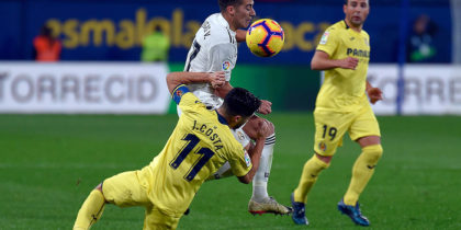 Villarreal's Spanish defender Jaume Costa (L) vies with Real Madrid's Spanish midfielder Lucas Vazquez during the Spanish League football match between Villarreal CF and Real Madrid CF at La Ceramica stadium in Vila-real on January 3, 2019. (Photo by JOSE JORDAN / AFP) (Photo credit should read JOSE JORDAN/AFP/Getty Images)