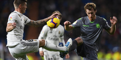 Real Madrid's German midfielder Toni Kroos (L) vies with Real Sociedad's Spanish midfielder David Zurutuza during the Spanish League football match between Real Madrid CF and Real Sociedad at the Santiago Bernabeu stadium in Madrid on January 6, 2019. (Photo by GABRIEL BOUYS / AFP) (Photo credit should read GABRIEL BOUYS/AFP/Getty Images)