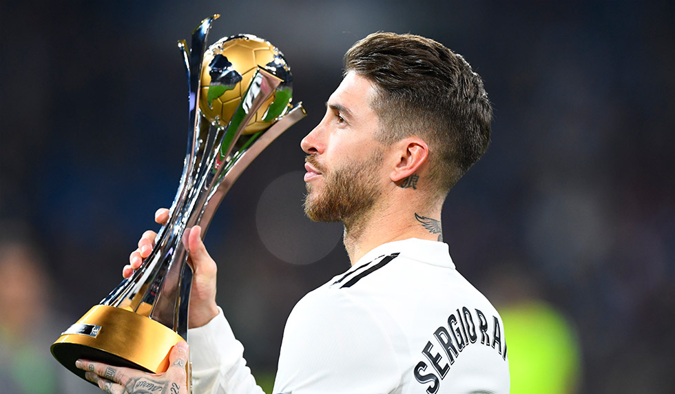 Real Madrid's Spanish defender Sergio Ramos holds the winner's trophy of the 2018 FIFA Club World Cup before the Spanish League football match between Real Madrid CF and Real Sociedad at the Santiago Bernabeu stadium in Madrid on January 6, 2019. (Photo by GABRIEL BOUYS / AFP) (Photo credit should read GABRIEL BOUYS/AFP/Getty Images)