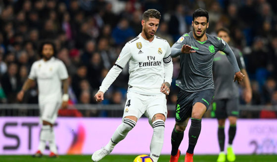 Real Madrid's Spanish defender Sergio Ramos (L) vies with Real Sociedad's Spanish midfielder Mikel Merino during the Spanish League football match between Real Madrid CF and Real Sociedad at the Santiago Bernabeu stadium in Madrid on January 6, 2019. (Photo by GABRIEL BOUYS / AFP) (Photo credit should read GABRIEL BOUYS/AFP/Getty Images)