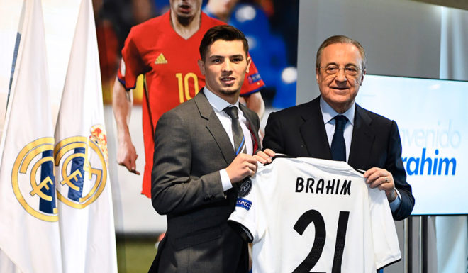 Former Manchester City's Spanish midfielder Brahim Diaz (L) holds his new jersey with Real Madrid's president Florentino Perez during his oficial presentation as Real Madrid's player at the Santiago Bernabeu stadium in Madrid on January 7, 2019. - Real Madrid has signed the 19-year-old midfielder Brahim Diaz from Manchester City, who has agreed a contract for six and a half years with Real after undergoing a medical check-up today, before being officially unveiled at the Santiago Bernabeu. (Photo by GABRIEL BOUYS / AFP) (Photo credit should read GABRIEL BOUYS/AFP/Getty Images)