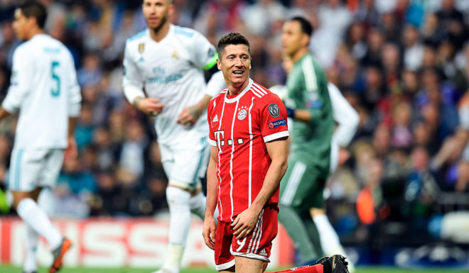 Bayern Munich's Polish forward Robert Lewandowski reacts during the UEFA Champions League semi-final second leg football match between Real Madrid and Bayern Munich at the Santiago Bernabeu Stadium in Madrid on May 1, 2018. (Photo by OSCAR DEL POZO / AFP) (Photo credit should read OSCAR DEL POZO/AFP/Getty Images)