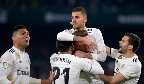 Real Madrid's Spanish midfielder Daniel Ceballos (C) celebrates after scoring a goal during the Spanish League football match between Real Betis and Real Madrid CF at the Benito Villamarin stadium in Seville on January 13, 2019. (Photo by CRISTINA QUICLER / AFP) (Photo credit should read CRISTINA QUICLER/AFP/Getty Images)