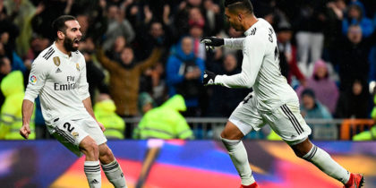 Real Madrid's Brazilian midfielder Casemiro (R) celebrates with Real Madrid's Spanish defender Dani Carvajal after scoring a goal during the Spanish League football match between Real Madrid and Sevilla at the Santiago Bernabeu stadium in Madrid on January 19, 2019. (Photo by PIERRE-PHILIPPE MARCOU / AFP) (Photo credit should read PIERRE-PHILIPPE MARCOU/AFP/Getty Images)