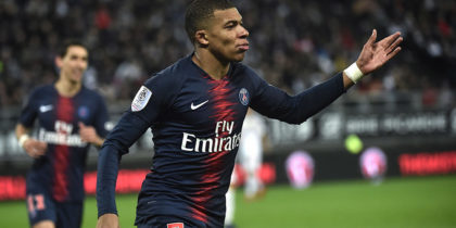 Paris Saint-Germain's French forward Kylian Mbappe celebrates after scoring during the French L1 football match between Amiens and Paris on January 12, 2019 at the Licorne stadium in Amiens. (Photo by FRANCOIS LO PRESTI / AFP) (Photo credit should read FRANCOIS LO PRESTI/AFP/Getty Images)