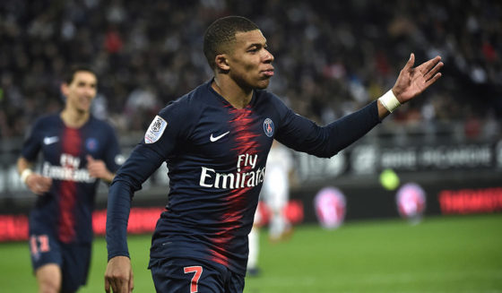 Paris Saint-Germain's French forward Kylian Mbappe celebrates after scoring during the French L1 football match between Amiens and Paris on January 12, 2019 at the Licorne stadium in Amiens. (Photo by FRANCOIS LO PRESTI / AFP) (Photo credit should read FRANCOIS LO PRESTI/AFP/Getty Images)