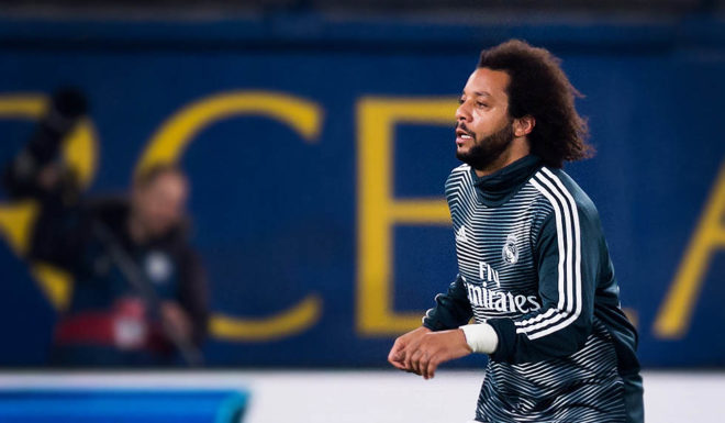 VILLAREAL, SPAIN - JANUARY 03: Marcelo and Luka Modric of Real Madrid CF warm up prior to the La Liga match between Villarreal CF and Real Madrid CF at Estadio de la Ceramica on January 03, 2019 in Villarreal, Spain. (Photo by Alex Caparros/Getty Images)