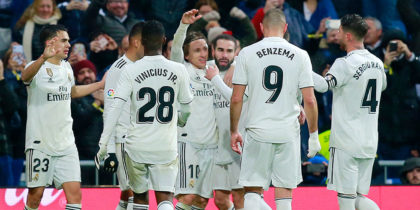 MADRID, SPAIN - JANUARY 19: Luka Modric of Real Madrid celebrates with teammates after scoring his sides second goal during the La Liga match between Real Madrid CF and Sevilla FC at Estadio Santiago Bernabeu on January 19, 2019 in Madrid, Spain. (Photo by Gonzalo Arroyo Moreno/Getty Images)