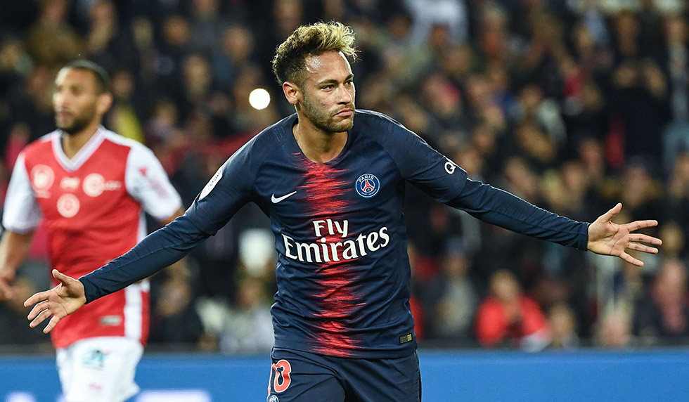 Paris Saint-Germain's Brazilian forward Neymar Jr celebrates after scoring a goal during the French L1 football match between Paris Saint Germain and Reims, on September 26, 2018 at the Parc des Princes stadium in Paris. (Photo by Anne-Christine POUJOULAT / AFP) (Photo credit should read ANNE-CHRISTINE POUJOULAT/AFP/Getty Images)