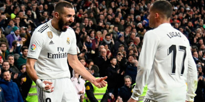 Real Madrid's French forward Karim Benzema (L) celebrates with Real Madrid's Spanish midfielder Lucas Vazquez after scoring during the Spanish Copa del Rey (King's Cup) quarter-final first leg football match between Real Madrid CF and Girona FC at the Santiago Bernabeu stadium in Madrid on January 24, 2019. (Photo by JAVIER SORIANO / AFP) (Photo credit should read JAVIER SORIANO/AFP/Getty Images)