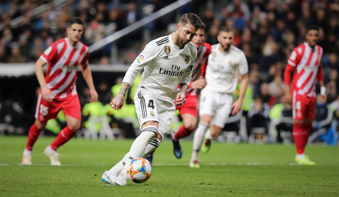 MADRID, SPAIN - JANUARY 24: Sergio Ramos of Real Madrid CF scores the second goal via a penalty shot during the Copa del Rey Quarter Final match between Real Madrid CF and Girona FC at Estadio Santiago Bernabeu on January 24, 2019 in Madrid, Spain. (Photo by Gonzalo Arroyo Moreno/Getty Images)