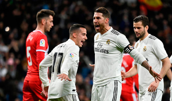 Real Madrid's Spanish defender Sergio Ramos (C) celebrates after scoring a penalty during the Spanish Copa del Rey (King's Cup) quarter-final first leg football match between Real Madrid CF and Girona FC at the Santiago Bernabeu stadium in Madrid on January 24, 2019. (Photo by JAVIER SORIANO / AFP) (Photo credit should read JAVIER SORIANO/AFP/Getty Images)