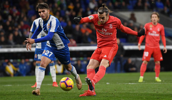 BARCELONA, SPAIN - JANUARY 27: Gareth Bale of Real Madrid scores his team's fourth goal during the La Liga match between RCD Espanyol and Real Madrid CF at RCDE Stadium on January 27, 2019 in Barcelona, Spain. (Photo by Alex Caparros/Getty Images)