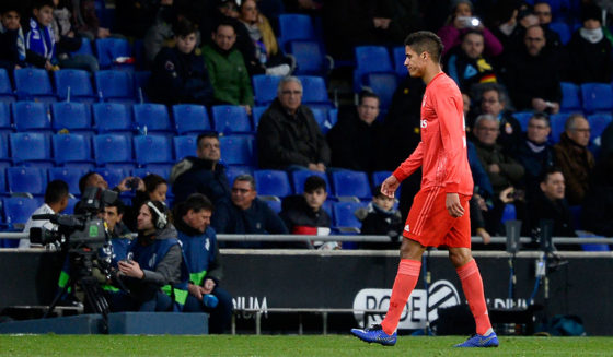 Real Madrid's French defender Raphael Varane walks off the pitch after receiving a red card during the Spanish league football match between RCD Espanyol and Real Madrid CF at the RCDE Stadium in Cornella de Llobregat on January 27, 2019. (Photo by Josep LAGO / AFP) (Photo credit should read JOSEP LAGO/AFP/Getty Images)