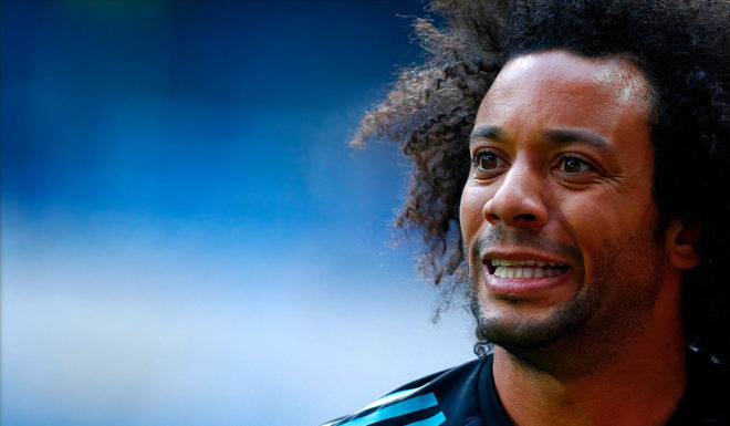 Real Madrid's Brazilian defender Marcelo warms up before the Spanish league football match between Real Madrid and Celta Vigo at the Santiago Bernabeu Stadium in Madrid on May 12, 2018. (Photo by Benjamin CREMEL / AFP) (Photo credit should read BENJAMIN CREMEL/AFP/Getty Images)