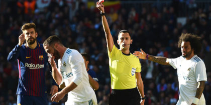 MADRID, SPAIN - DECEMBER 23: Daniel Carvajal of Real Madrid is shown a red card by referee Jose Maria Sanchez during the La Liga match between Real Madrid and Barcelona at Estadio Santiago Bernabeu on December 23, 2017 in Madrid, Spain. (Photo by Denis Doyle/Getty Images)