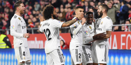 GIRONA, SPAIN - JANUARY 31: Karim Benzema of Real Madrid celebrates scoring to make it 2-0 with team mates during the Copa del Quarter Final match between Girona and Real Madrid at Montilivi Stadium on January 31, 2019 in Girona, Spain. (Photo by David Ramos/Getty Images )