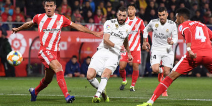 GIRONA, SPAIN - JANUARY 31: Karim Benzema of Real Madrid scores to make it 1-0 during the Copa del Quarter Final match between Girona and Real Madrid at Montilivi Stadium on January 31, 2019 in Girona, Spain. (Photo by David Ramos/Getty Images )