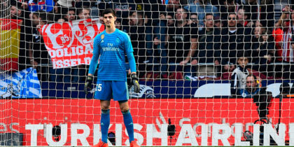 Real Madrid's Belgian goalkeeper Thibaut Courtois stands on the pitch during the Spanish league football match between Club Atletico de Madrid and Real Madrid CF at the Wanda Metropolitano stadium in Madrid on February 9, 2019. (Photo by GABRIEL BOUYS / AFP) (Photo credit should read GABRIEL BOUYS/AFP/Getty Images)