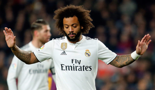 Real Madrid's Brazilian defender Marcelo gestures during the Spanish Copa del Rey (King's Cup) semi-final first leg football match between FC Barcelona and Real Madrid CF at the Camp Nou stadium in Barcelona on February 6, 2019. (Photo by Pau Barrena / AFP) (Photo credit should read PAU BARRENA/AFP/Getty Images)