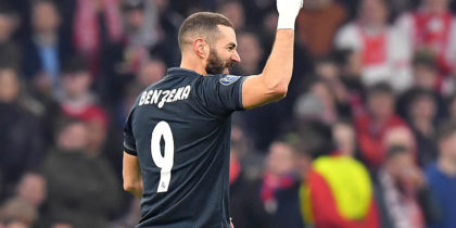 Real Madrid's French forward Karim Benzema celebrates after scoring during the UEFA Champions league round of 16 first leg football match between Ajax Amsterdam and Real Madrid at the Johan Cruijff ArenA on February 13, 2019. (Photo by EMMANUEL DUNAND / AFP) (Photo credit should read EMMANUEL DUNAND/AFP/Getty Images)