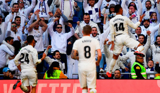 Real Madrid's Brazilian midfielder Casemiro (R) celebrates after scoring a goal during the Spanish League football match between Real Madrid and Girona at the Santiago Bernabeu stadium in Madrid on February 17, 2019. (Photo by GABRIEL BOUYS / AFP) (Photo credit should read GABRIEL BOUYS/AFP/Getty Images)