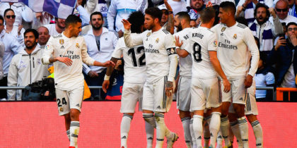 Real Madrid's players celebrate after scoring a goal during the Spanish League football match between Real Madrid and Girona at the Santiago Bernabeu stadium in Madrid on February 17, 2019. (Photo by GABRIEL BOUYS / AFP) (Photo credit should read GABRIEL BOUYS/AFP/Getty Images)