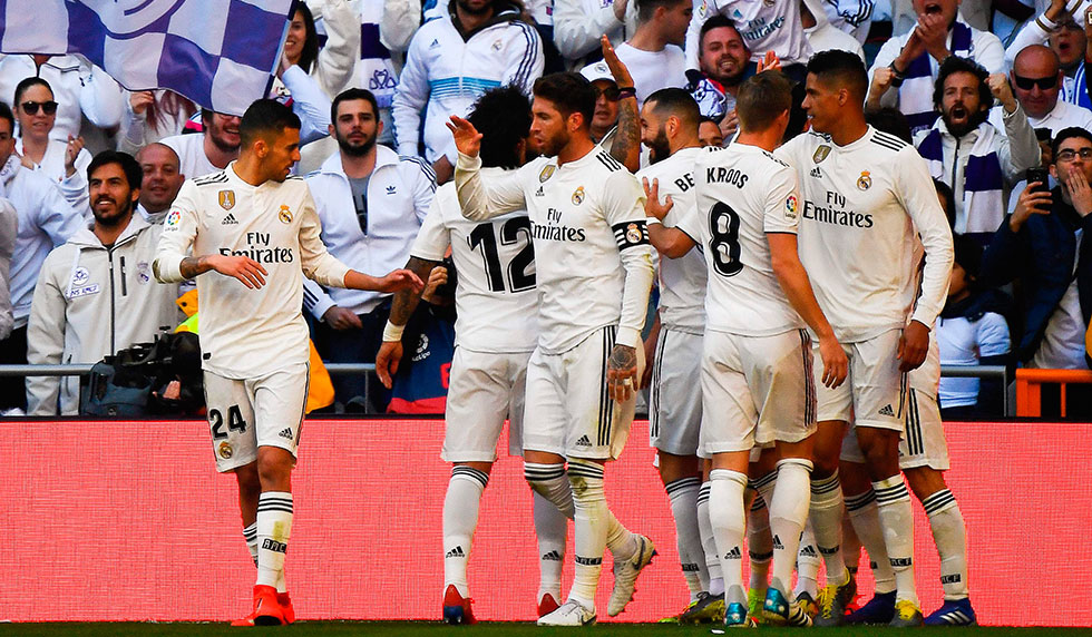Real Madrid's players celebrate after scoring a goal during the Spanish League football match between Real Madrid and Girona at the Santiago Bernabeu stadium in Madrid on February 17, 2019. (Photo by GABRIEL BOUYS / AFP) (Photo credit should read GABRIEL BOUYS/AFP/Getty Images)