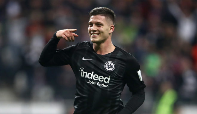 FRANKFURT AM MAIN, GERMANY - NOVEMBER 11: Luka Jovic of Eintracht Frankfurt celebrates after scoring his team's second goal during the Bundesliga match between Eintracht Frankfurt and FC Schalke 04 at Commerzbank-Arena on November 11, 2018 in Frankfurt am Main, Germany. (Photo by Alex Grimm/Bongarts/Getty Images)