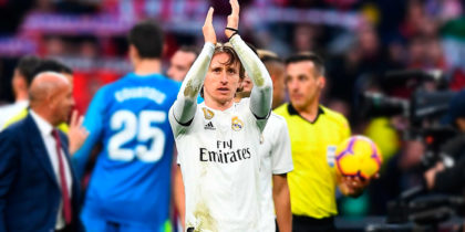 Real Madrid's Croatian midfielder Luka Modric (C) celebrates at the end of the Spanish league football match between Club Atletico de Madrid and Real Madrid CF at the Wanda Metropolitano stadium in Madrid on February 9, 2019. (Photo by GABRIEL BOUYS / AFP) (Photo credit should read GABRIEL BOUYS/AFP/Getty Images)