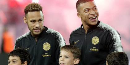(LtoR) Paris Saint-Germain's Brazilian forward Neymar, Paris Saint-Germain's French forward Kylian Mbappe and Paris Saint-Germain's German defender Thilo Kehrer stand on the pitch prior to the French L1 football match Bordeaux vs Paris Saint-Germain (PSG), on December 2, 2018 in Bordeaux, southwestern France. (Photo by ROMAIN PERROCHEAU / AFP) (Photo credit should read ROMAIN PERROCHEAU/AFP/Getty Images)