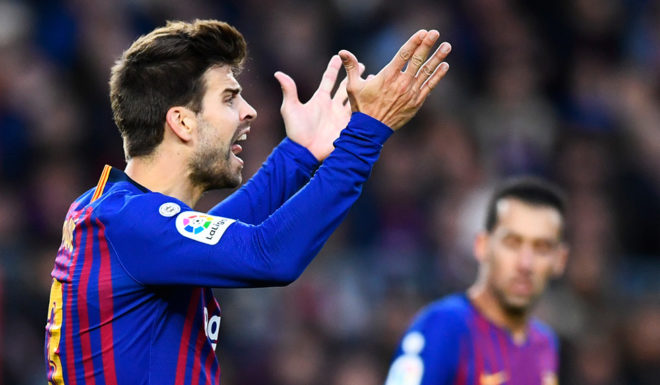 Barcelona's Spanish defender Gerard Pique protests during the Spanish league football match between FC Barcelona and Real Madrid CF at the Camp Nou stadium in Barcelona on October 28, 2018. (Photo by GABRIEL BOUYS / AFP) (Photo credit should read GABRIEL BOUYS/AFP/Getty Images)