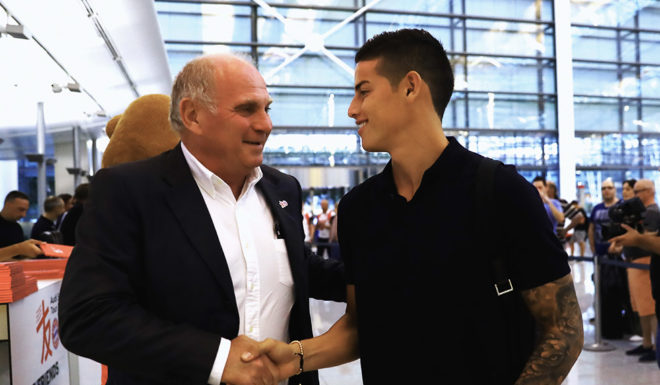 MUNICH, GERMANY - JULY 16: Uli Hoeness, President of FC Bayern Muenchen talks to James Rodriguez prior their team flight to Shanghai for the FC Bayern Muenchen Pre-Season Tour on July 16, 2017 in Munich, Germany. (Photo by Alexander Hassenstein/Bongarts/Getty Images)