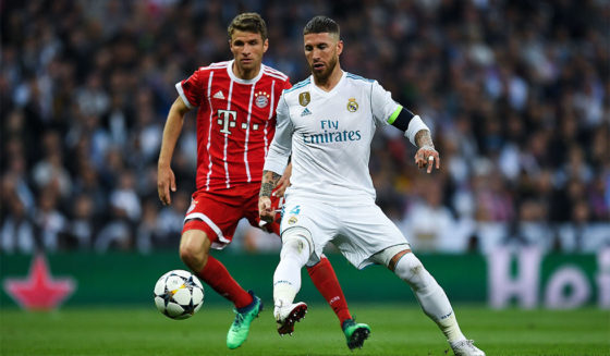 MADRID, SPAIN - MAY 01: Sergio Ramos of Real Madrid CF competes for the ball with Thomas Muller of FC Bayern Muenchen during the UEFA Champions League Semi Final Second Leg match between Real Madrid and Bayern Muenchen at the Bernabeu on May 1, 2018 in Madrid, Spain. (Photo by David Ramos/Getty Images)