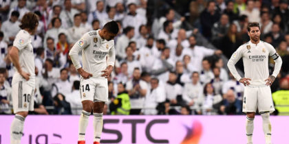 Real Madrid players react to Barcelona's opener during the Spanish league football match between Real Madrid CF and FC Barcelona at the Santiago Bernabeu stadium in Madrid on March 2, 2019. (Photo by OSCAR DEL POZO / AFP) (Photo credit should read OSCAR DEL POZO/AFP/Getty Images)