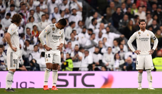 Real Madrid players react to Barcelona's opener during the Spanish league football match between Real Madrid CF and FC Barcelona at the Santiago Bernabeu stadium in Madrid on March 2, 2019. (Photo by OSCAR DEL POZO / AFP) (Photo credit should read OSCAR DEL POZO/AFP/Getty Images)