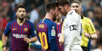 Barcelona's Argentinian forward Lionel Messi (2L) argues with Real Madrid's Spanish defender Sergio Ramos during the Spanish league football match between Real Madrid CF and FC Barcelona at the Santiago Bernabeu stadium in Madrid on March 2, 2019. (Photo by CURTO DE LA TORRE / AFP) (Photo credit should read CURTO DE LA TORRE/AFP/Getty Images)